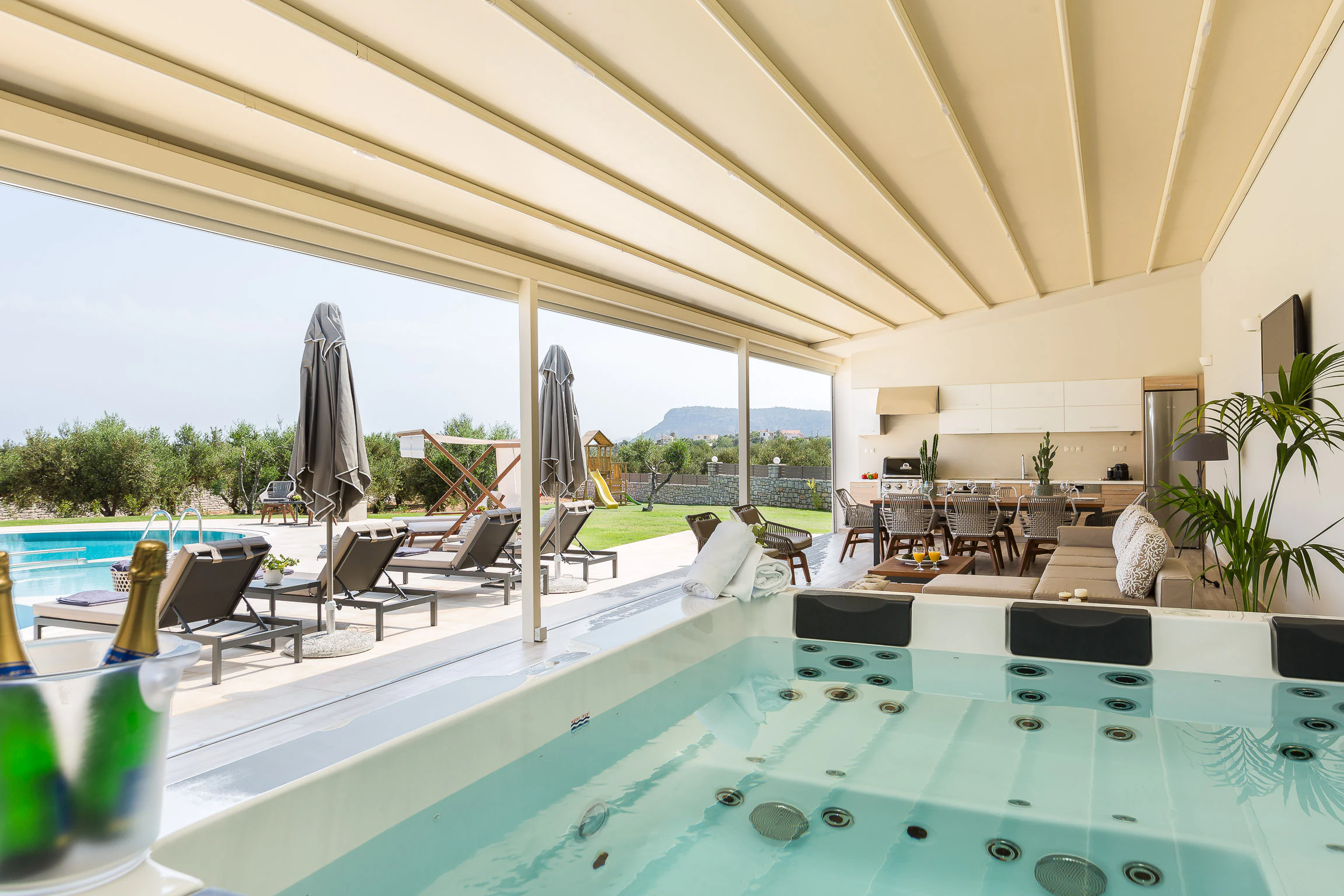 Heated spa beside the pool terrace
