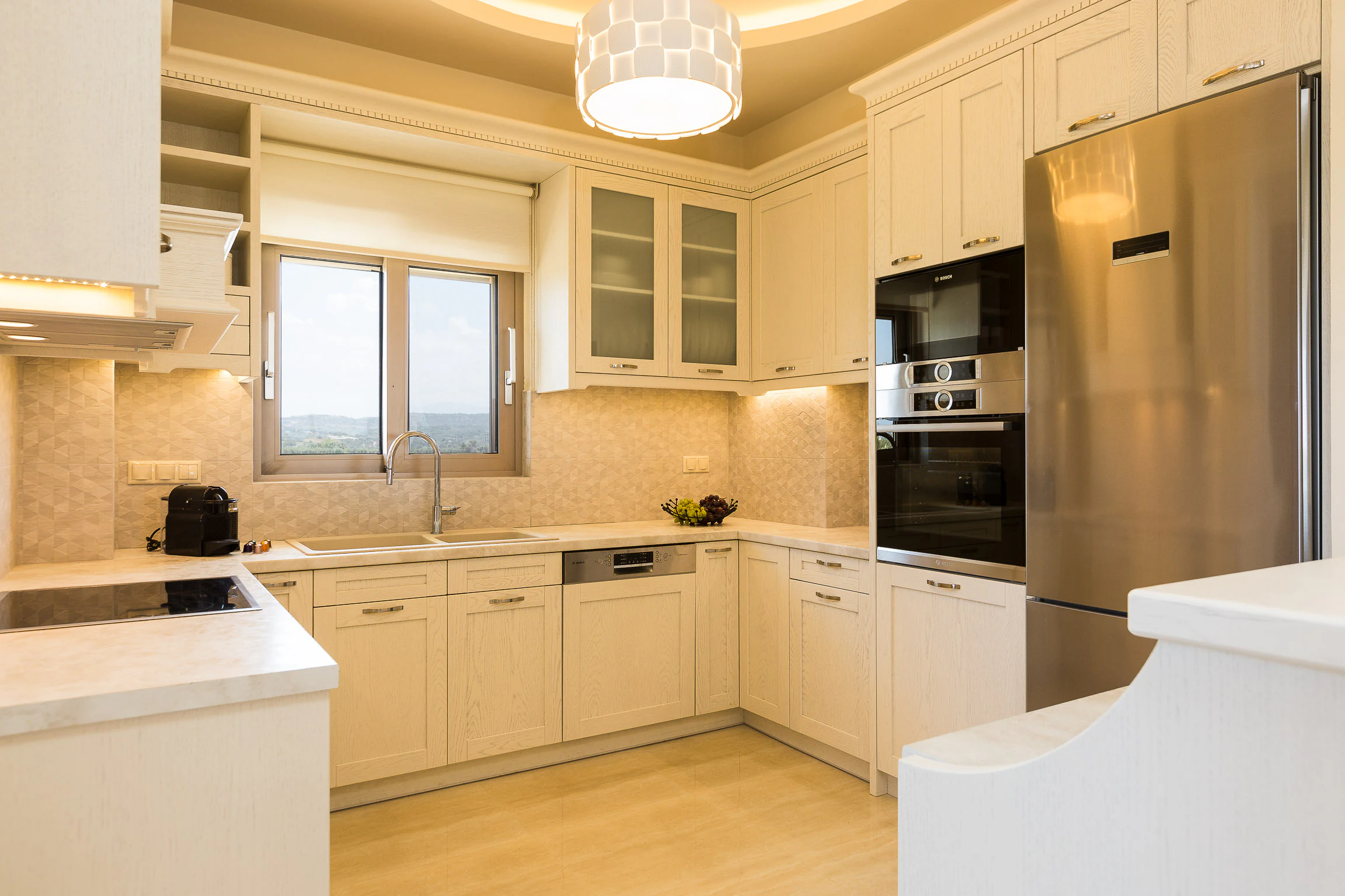 Fully equipped main kitchen at Aelia Residence