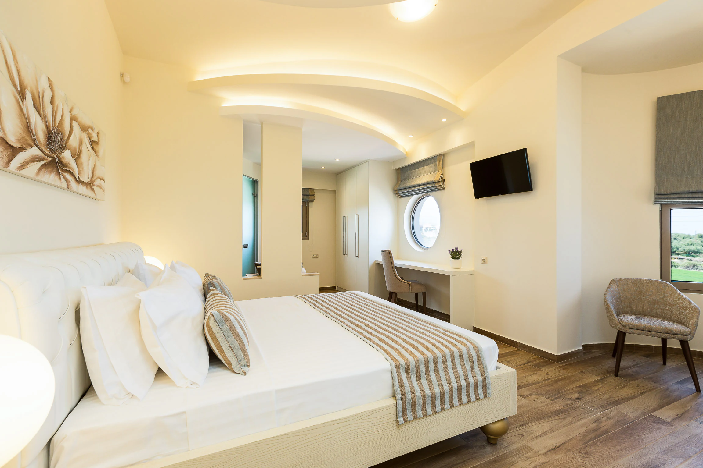 Double bedroom suite with warm wood furniture