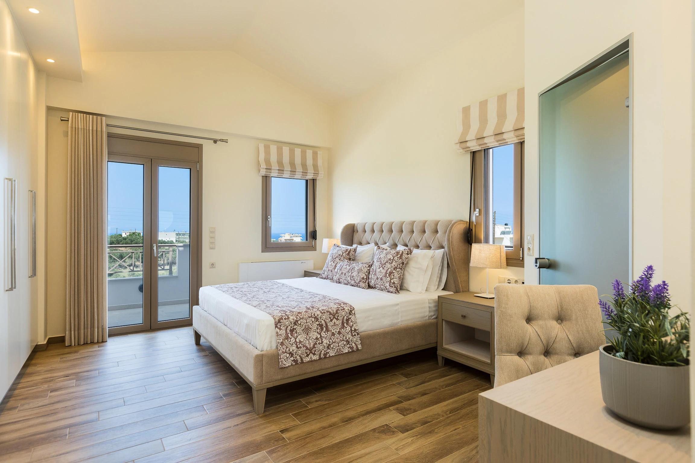 Bedroom opening onto a private balcony