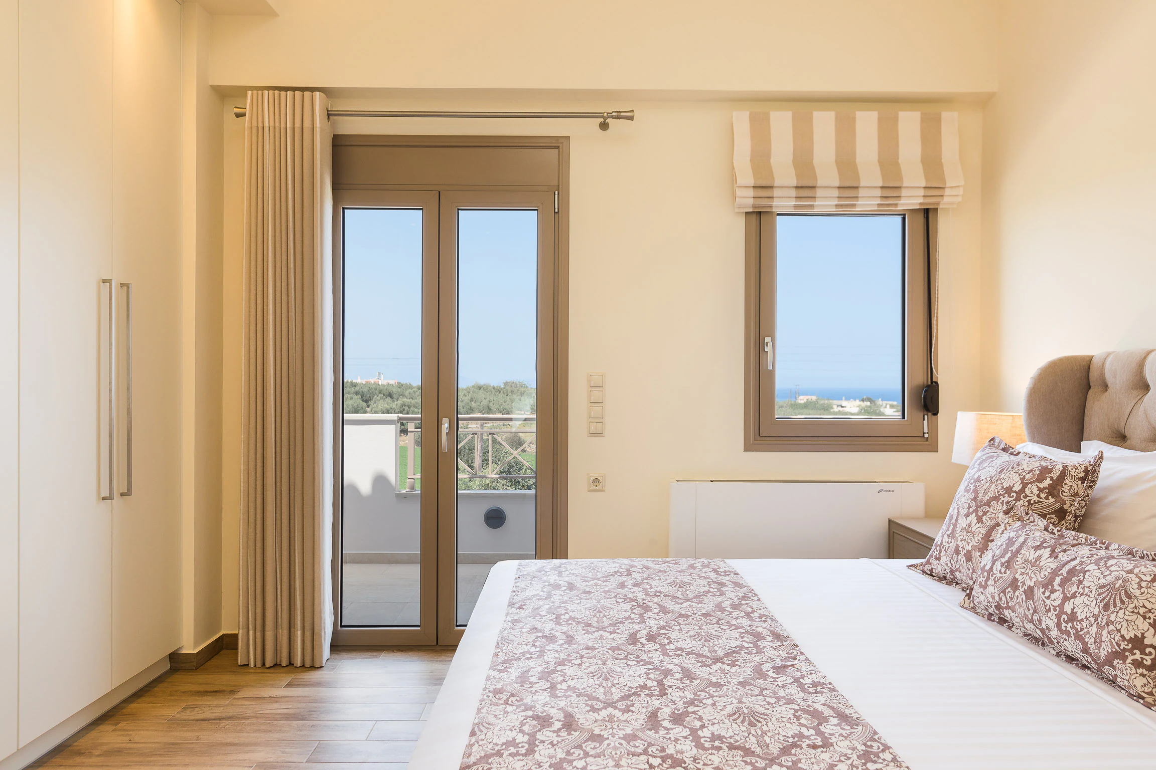 Double bedroom with rose-coloured details