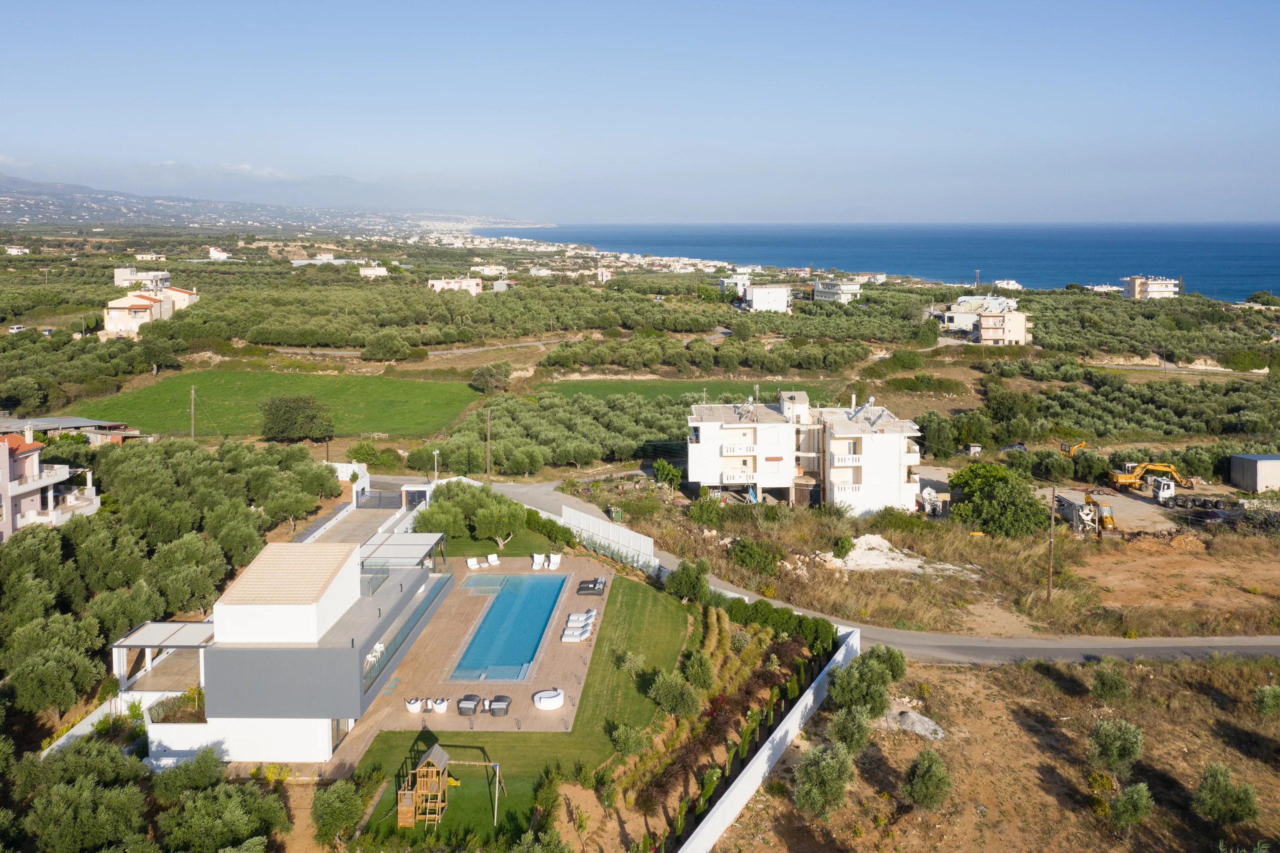 Aerial view of the private estate within the Cretan landscape at Aesthea Exclusive Villa