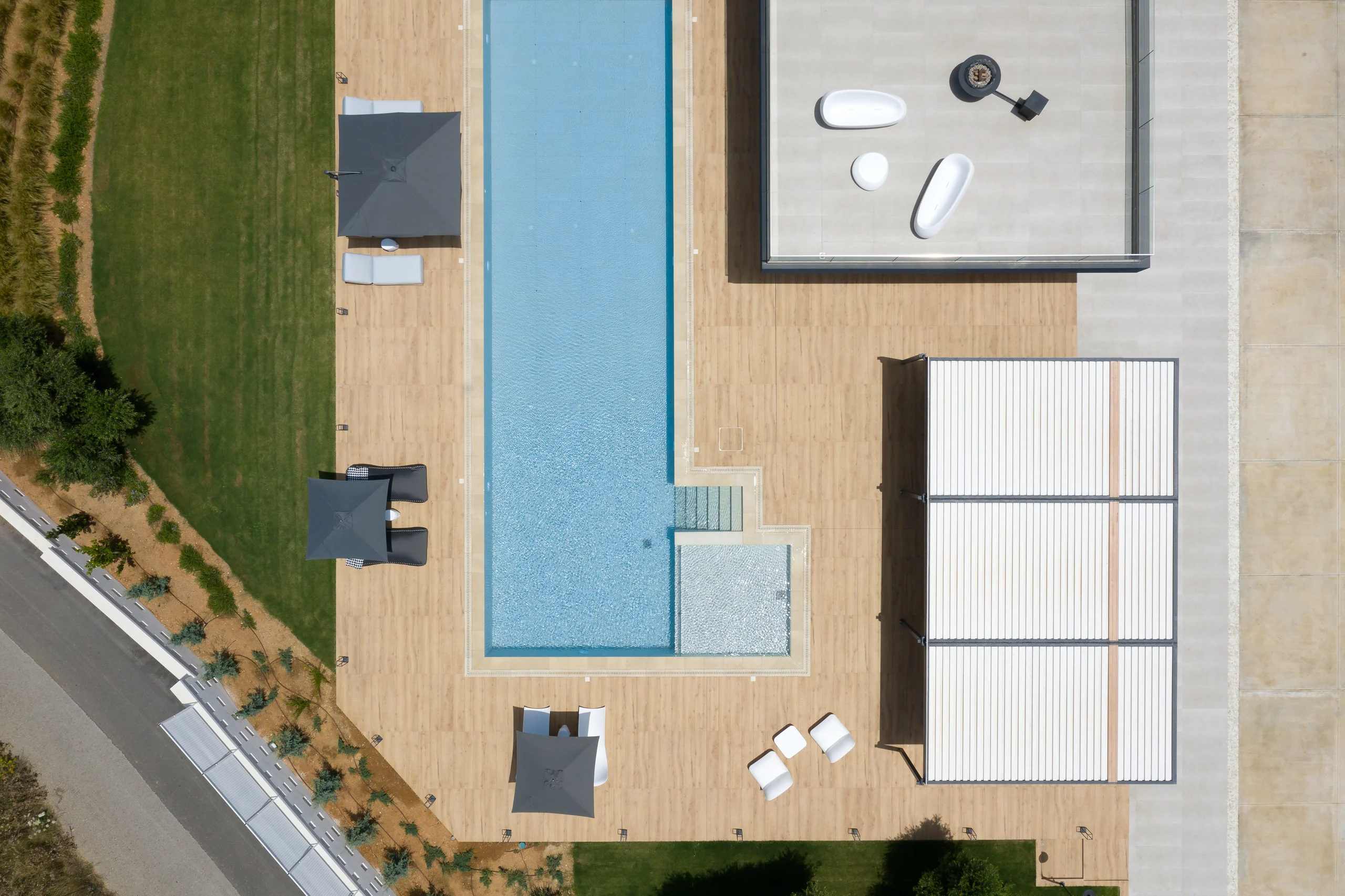 Top-down view of the main pool and built-in children’s compartment at Aesthea Exclusive Villa
