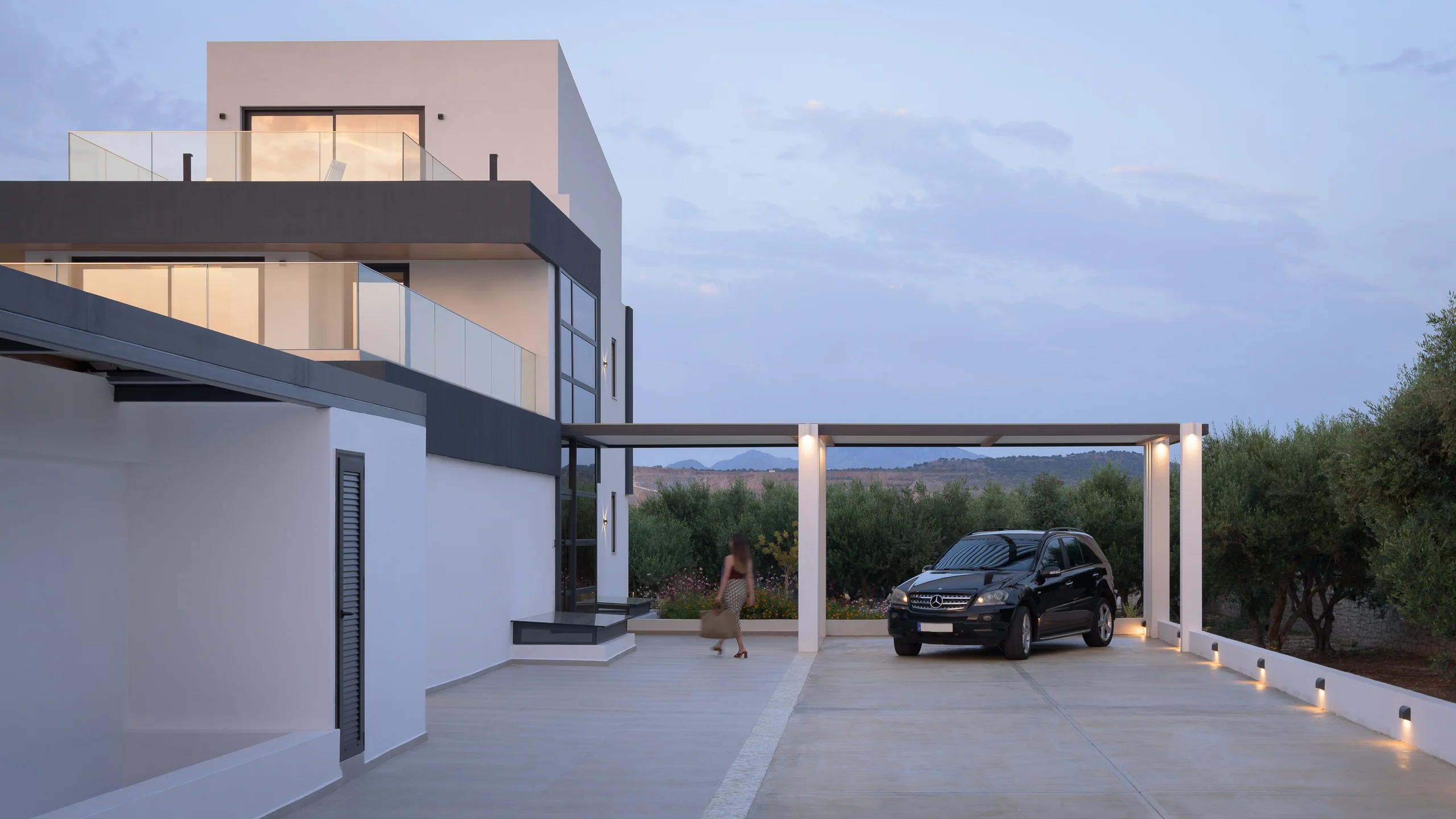 Covered private parking beside the villa entrance at Aesthea Exclusive Villa