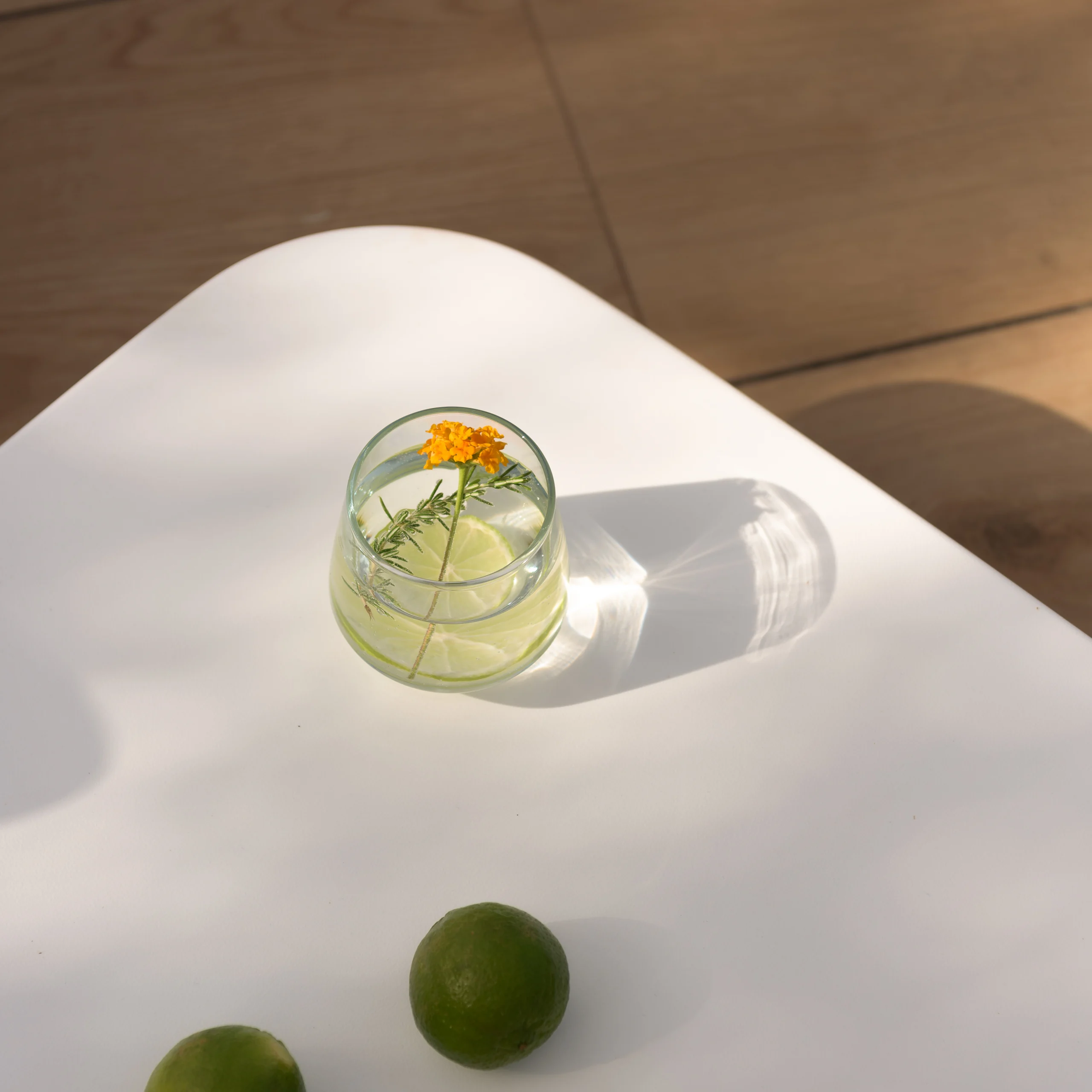Chilled summer drink catching the poolside sunlight at Aesthea Exclusive Villa