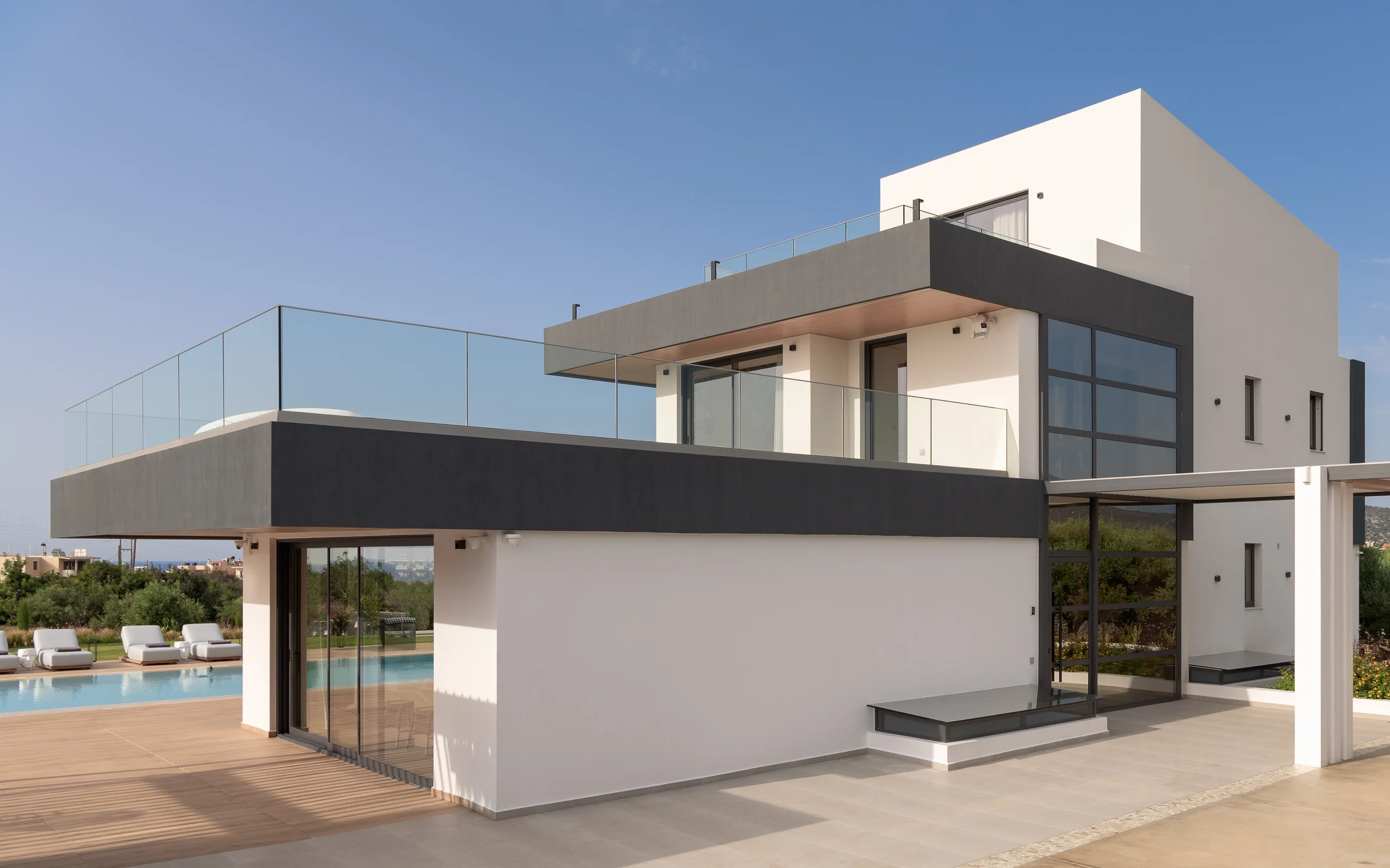 Pool pavilion and shaded terrace beside the residence at Aesthea Exclusive Villa