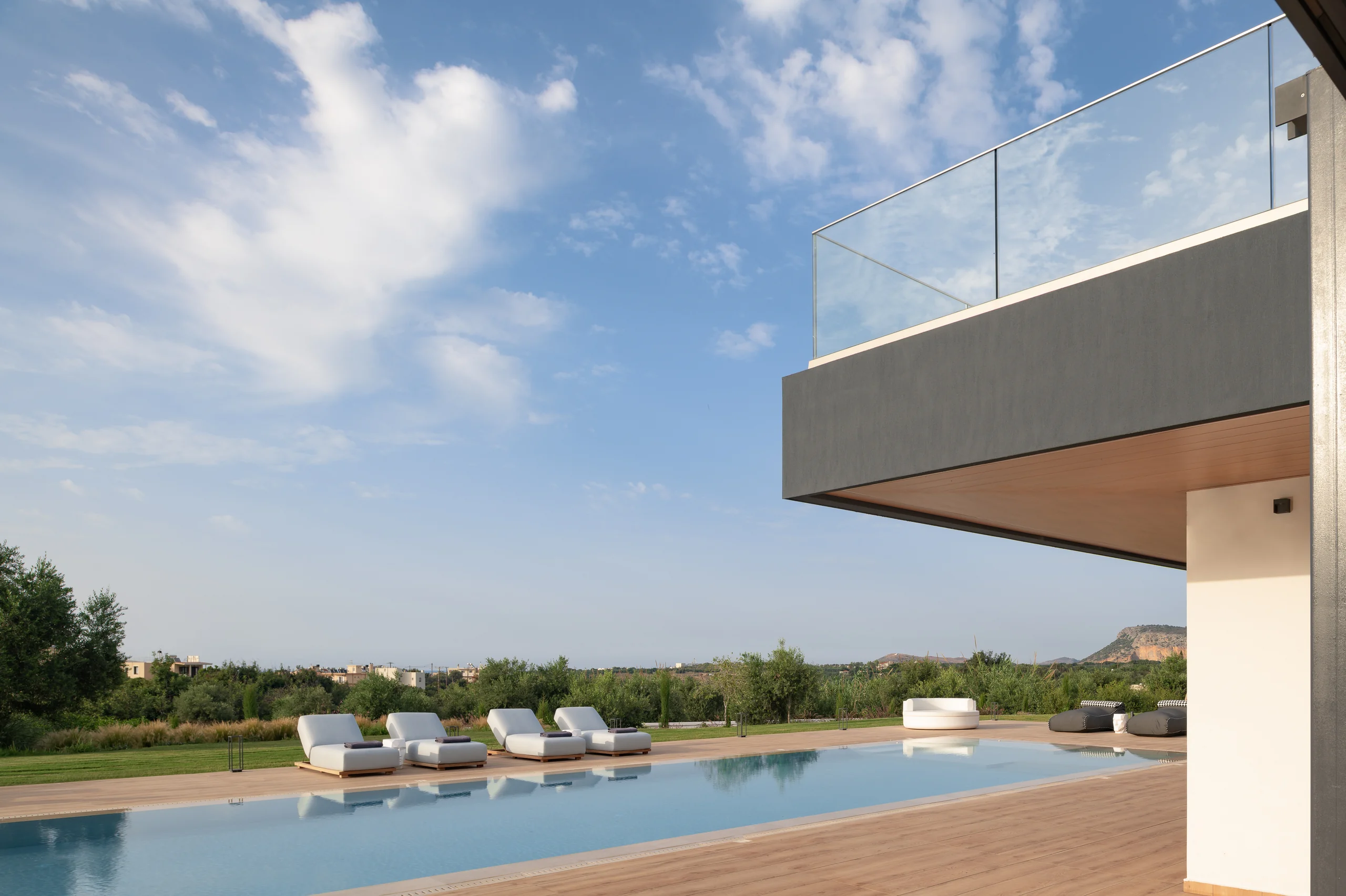 Infinity-edge perspective beside the villa’s cantilevered terrace at Aesthea Exclusive Villa