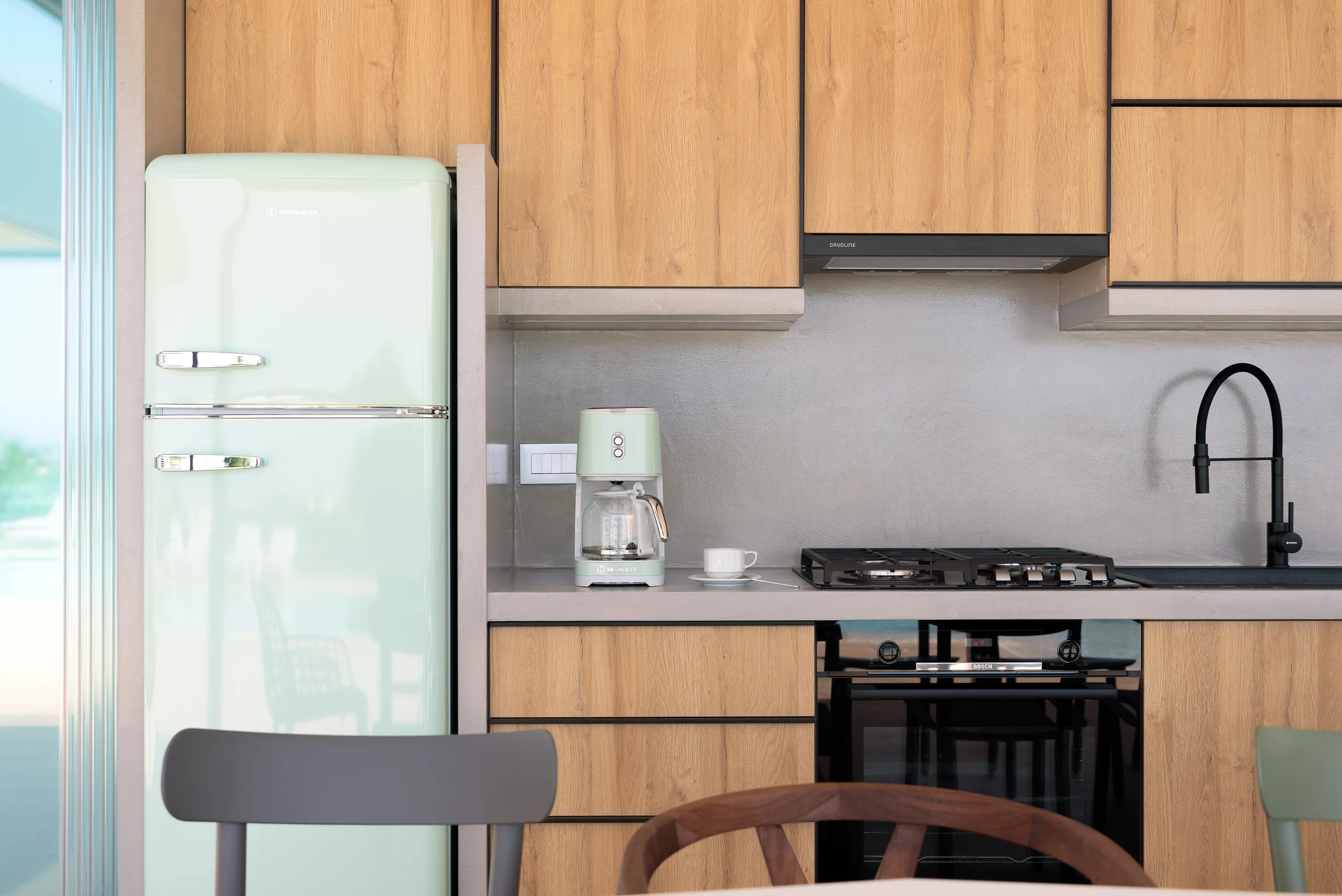 Fully equipped outdoor kitchen beside the pool terrace at Aesthea Exclusive Villa