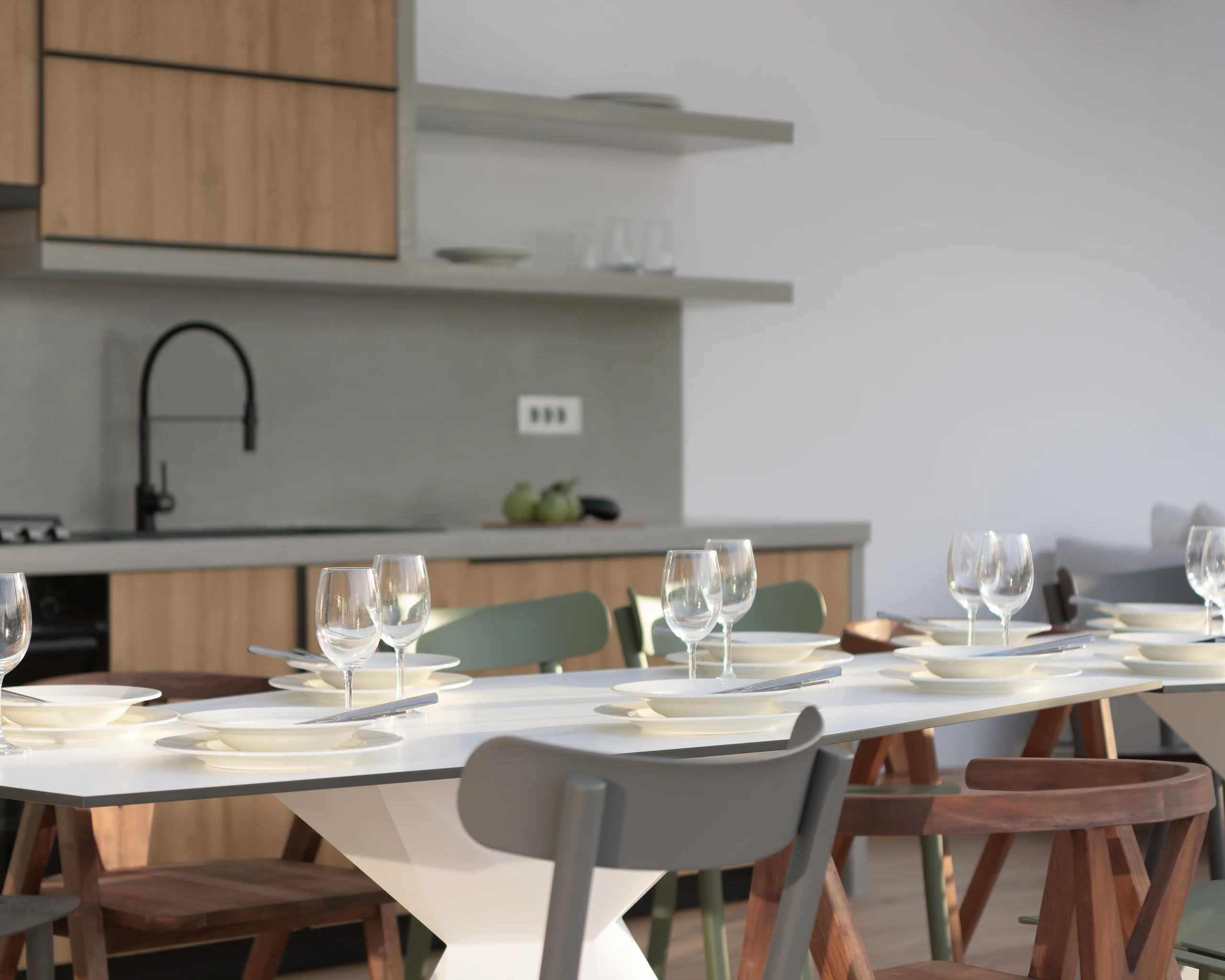 Dining table prepared beside the outdoor kitchen at Aesthea Exclusive Villa
