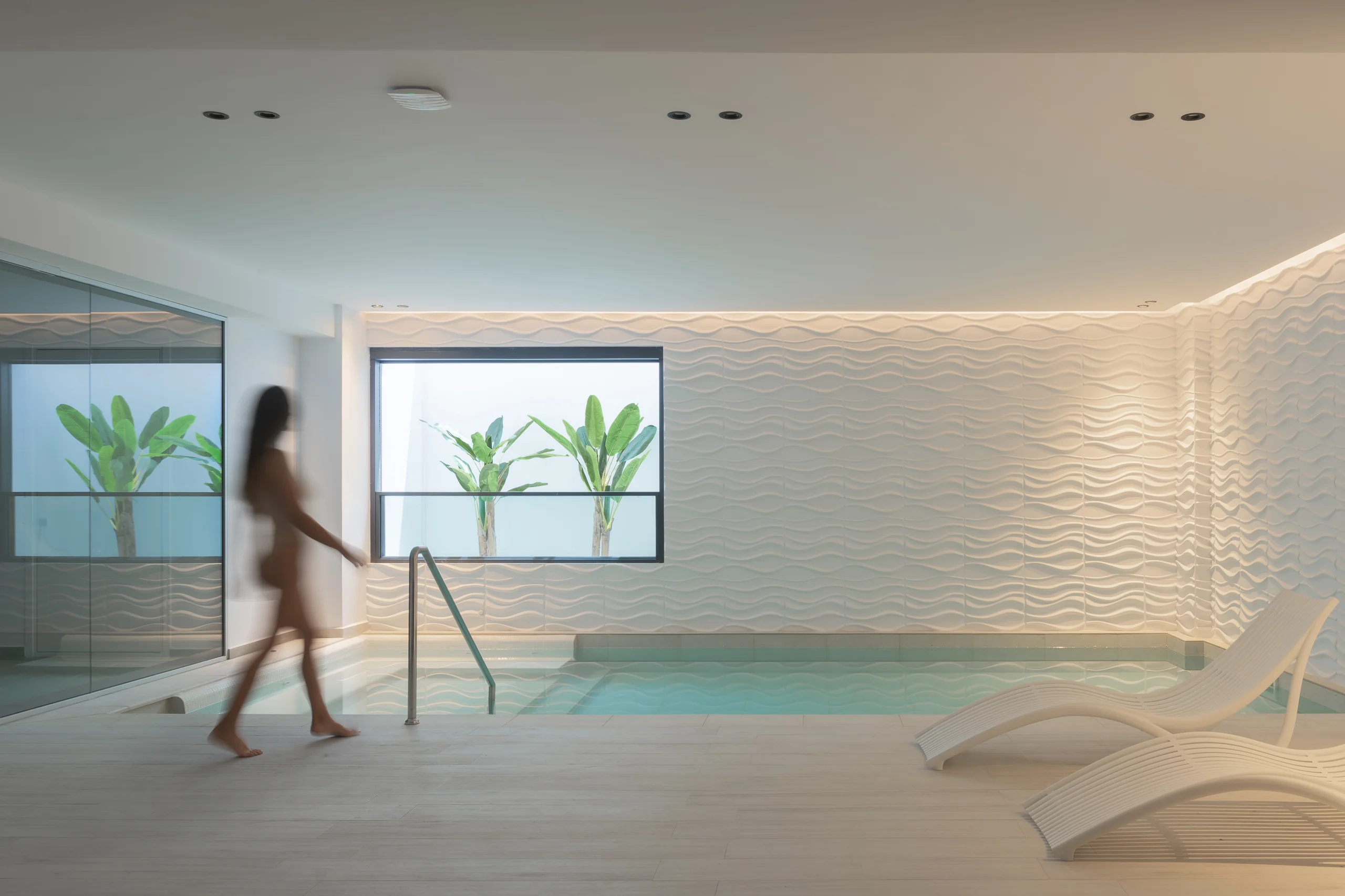 Heated indoor pool within the lower-level wellness suite at Aesthea Exclusive Villa