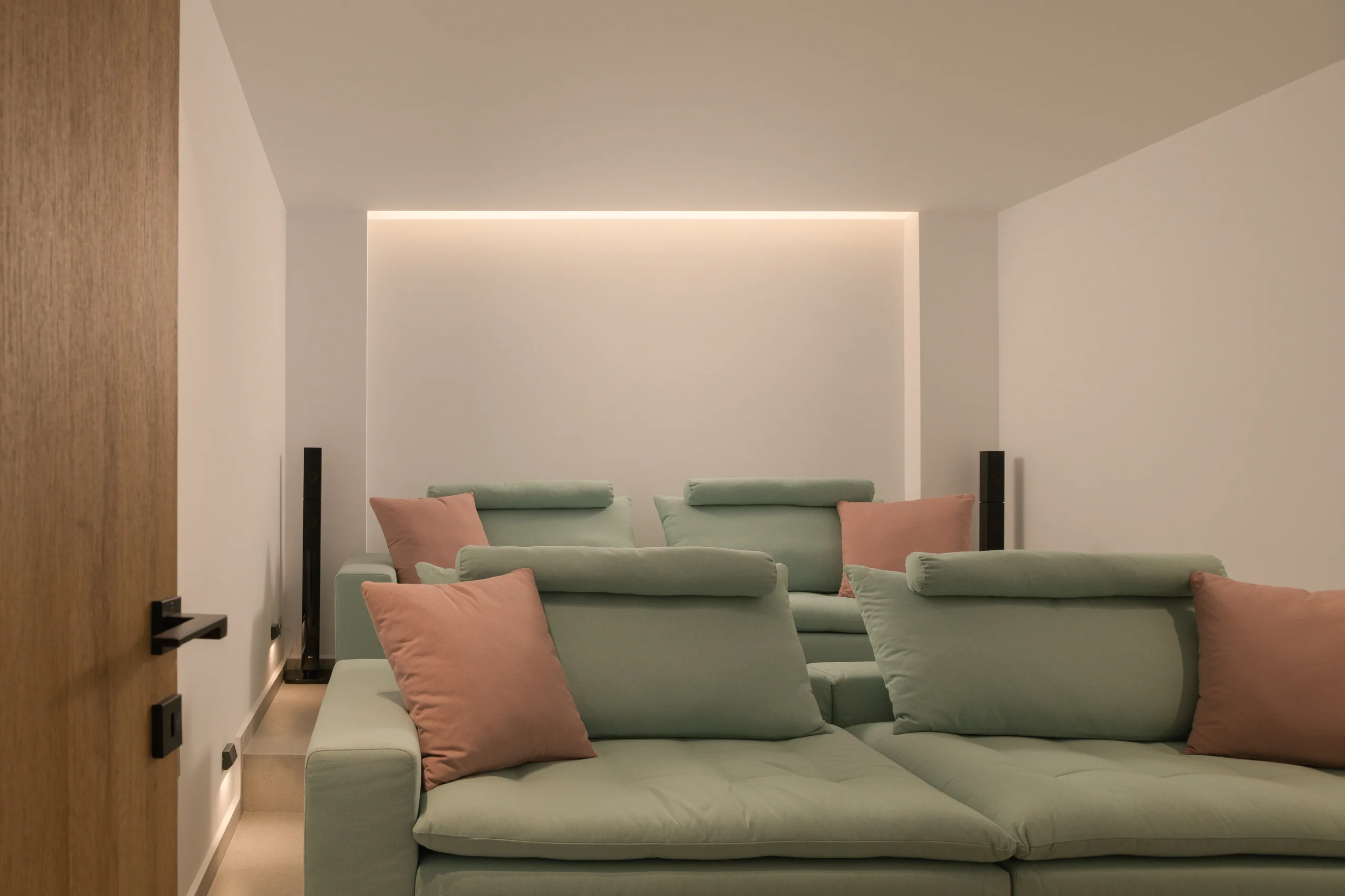 Soft cinema seating in the private screening room at Aesthea Exclusive Villa