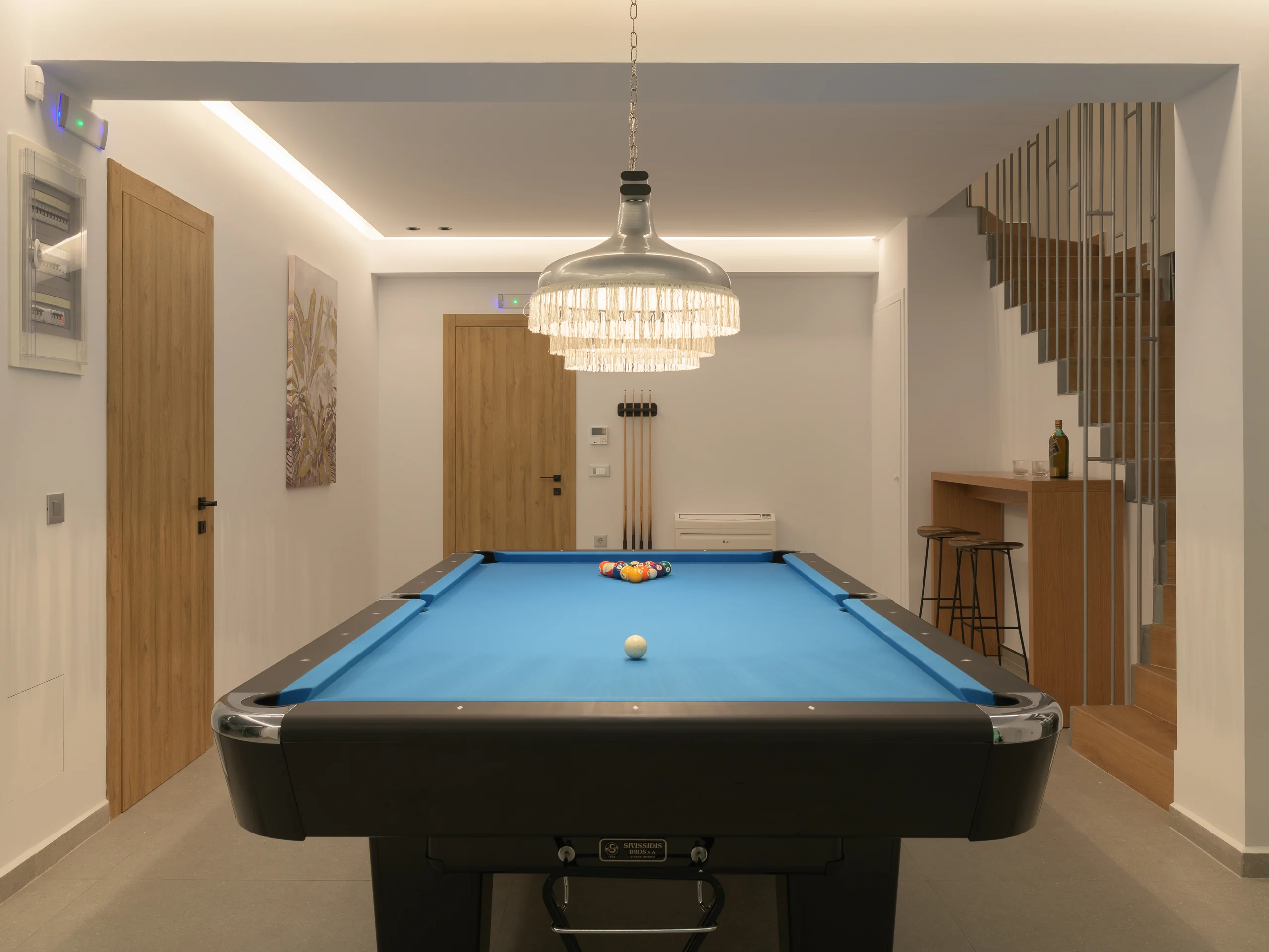 Full-size pool table in the lower-level games room at Aesthea Exclusive Villa
