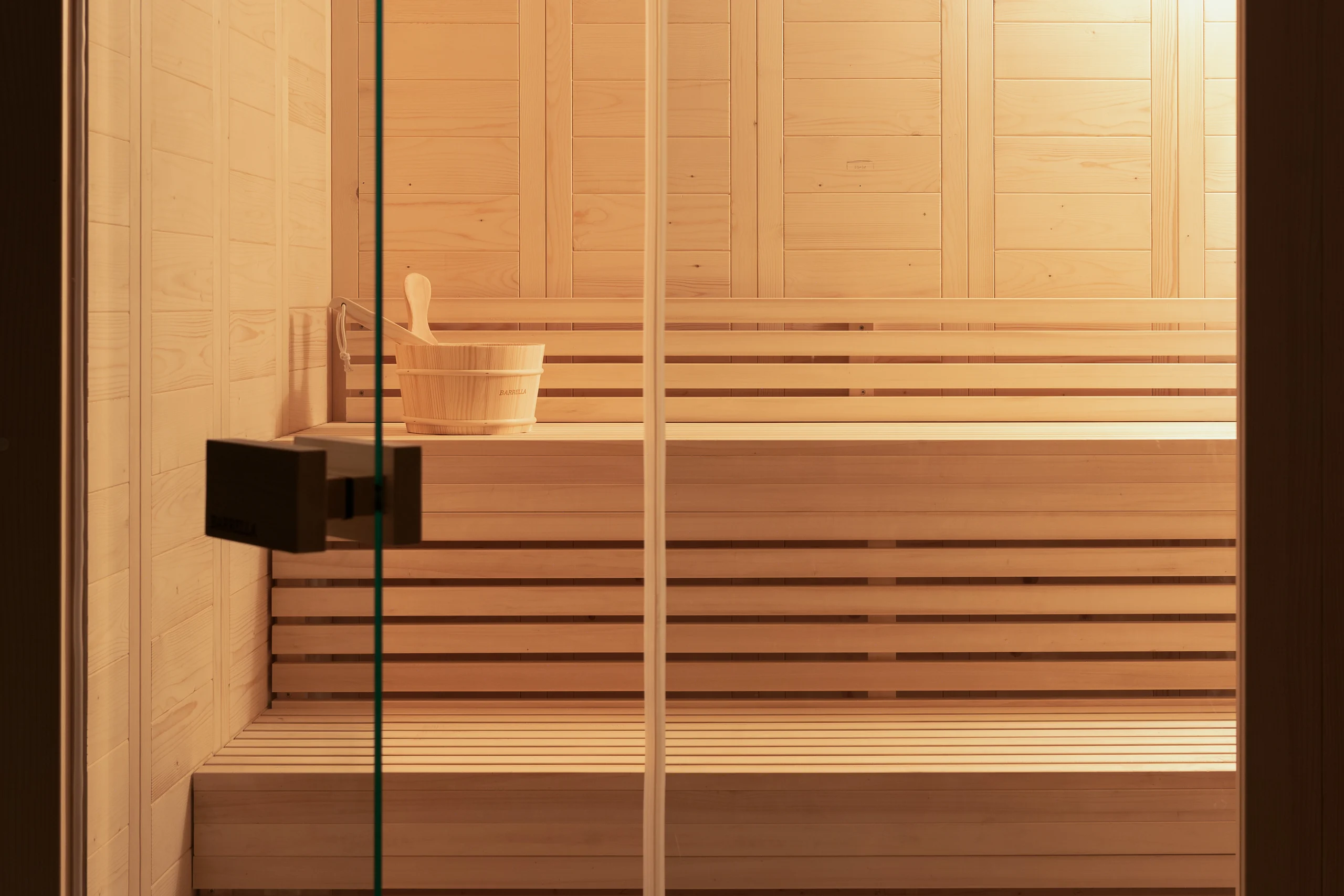 Private timber-lined sauna beside the wellness spaces at Aesthea Exclusive Villa
