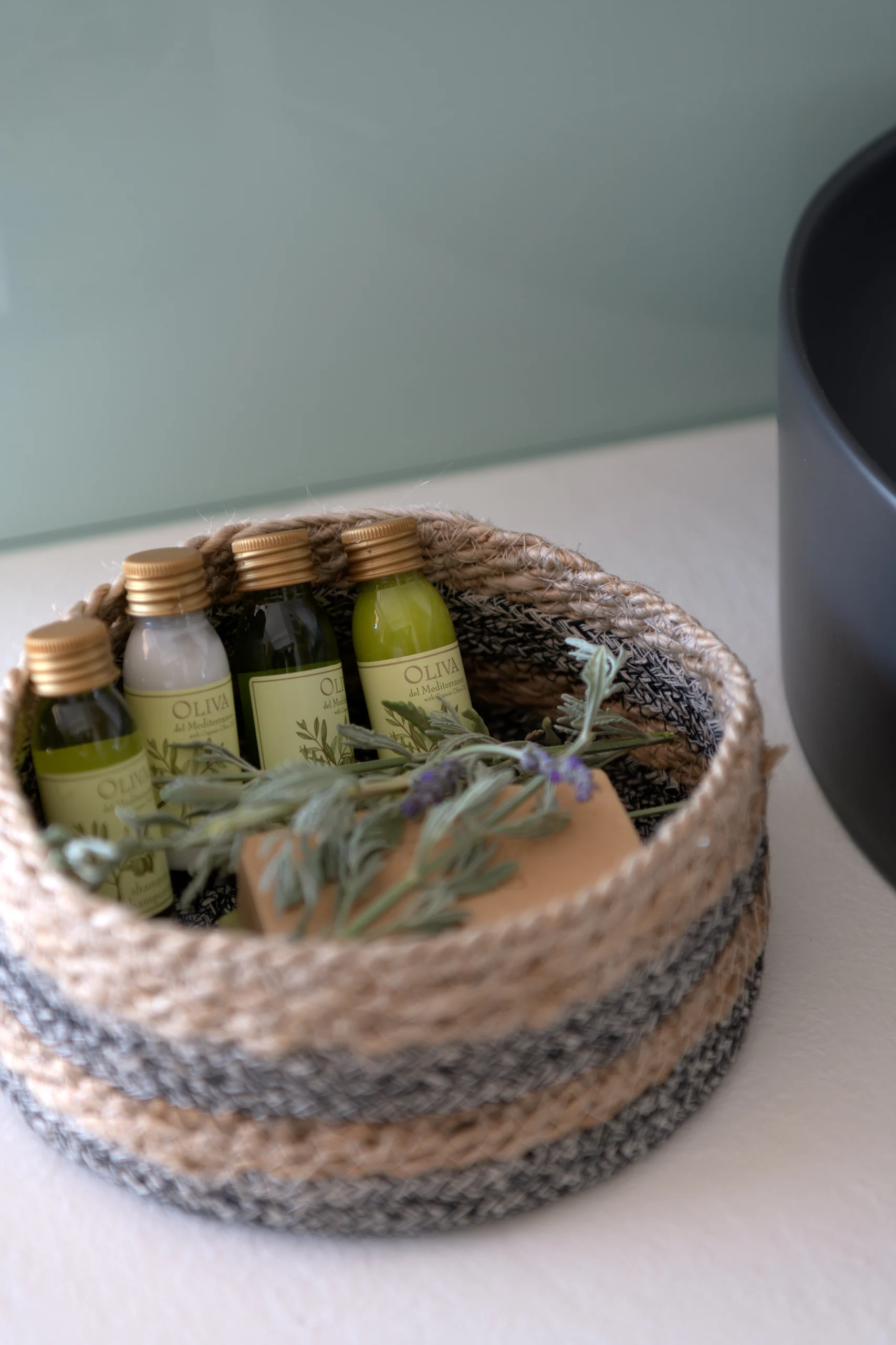 Basket of spa toiletries prepared for guests at Aesthea Exclusive Villa
