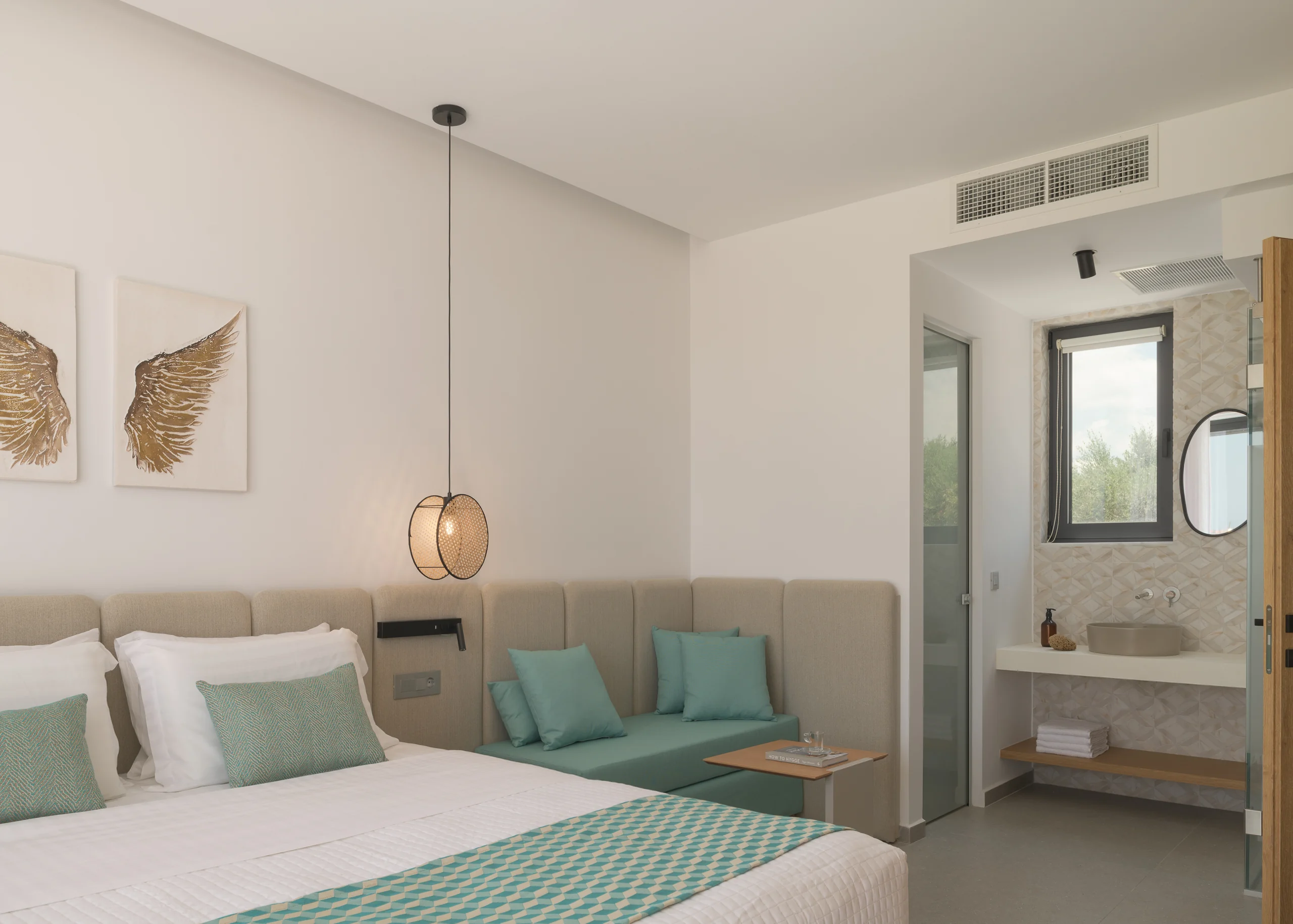 Ground-floor Bedroom 2 with a queen bed, sofa bed and ensuite shower at Aesthea Exclusive Villa