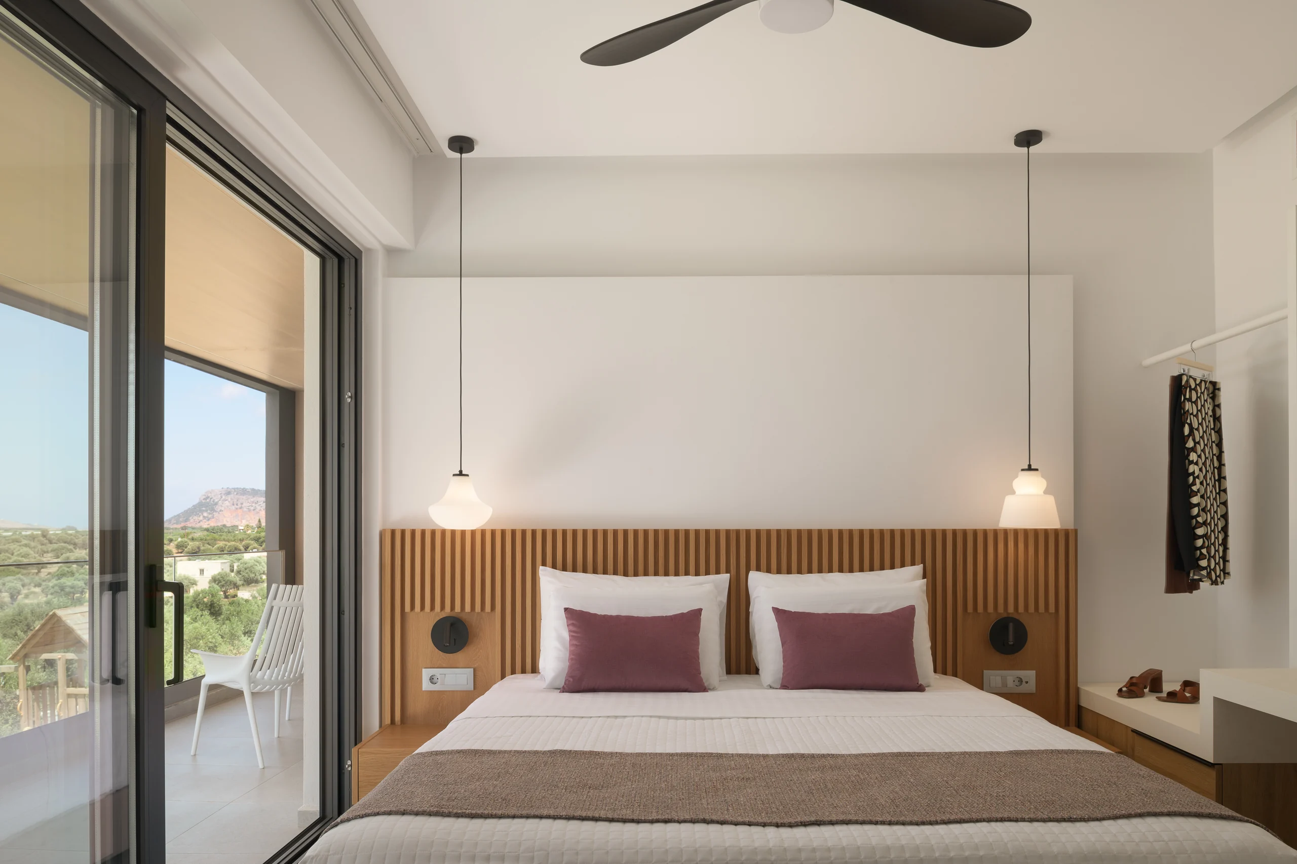 First-floor Bedroom 1 with a double bed and far-reaching rural view at Aesthea Exclusive Villa