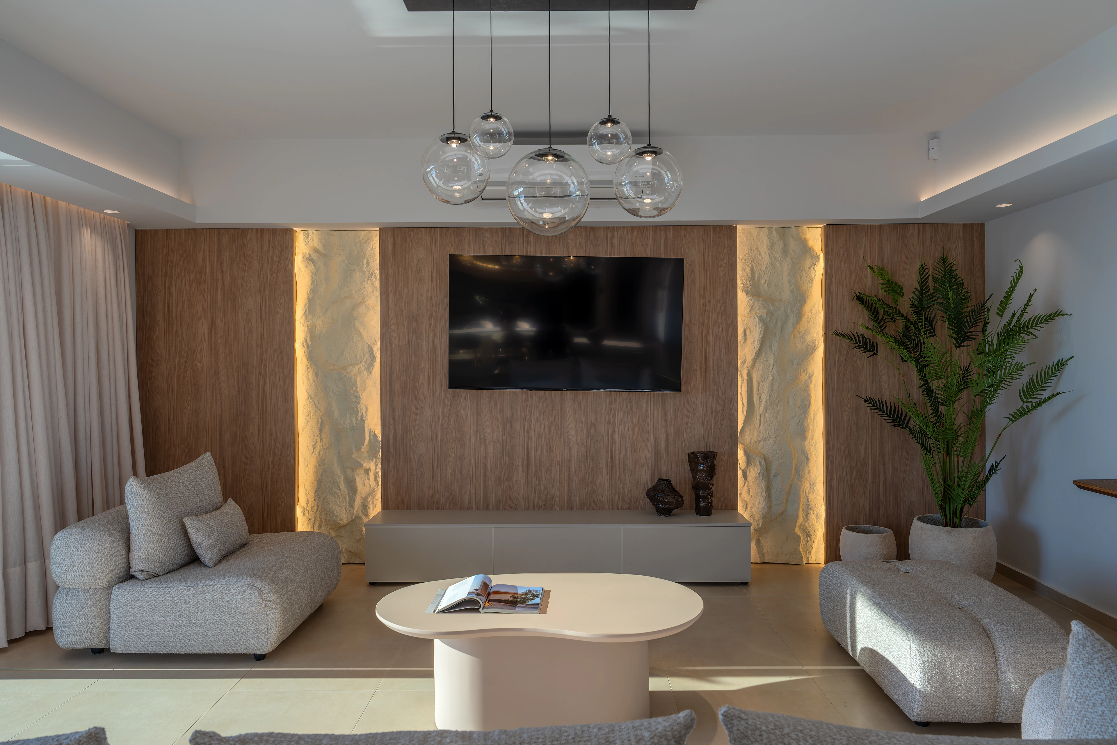 Right Crete living space opening toward the pool terrace