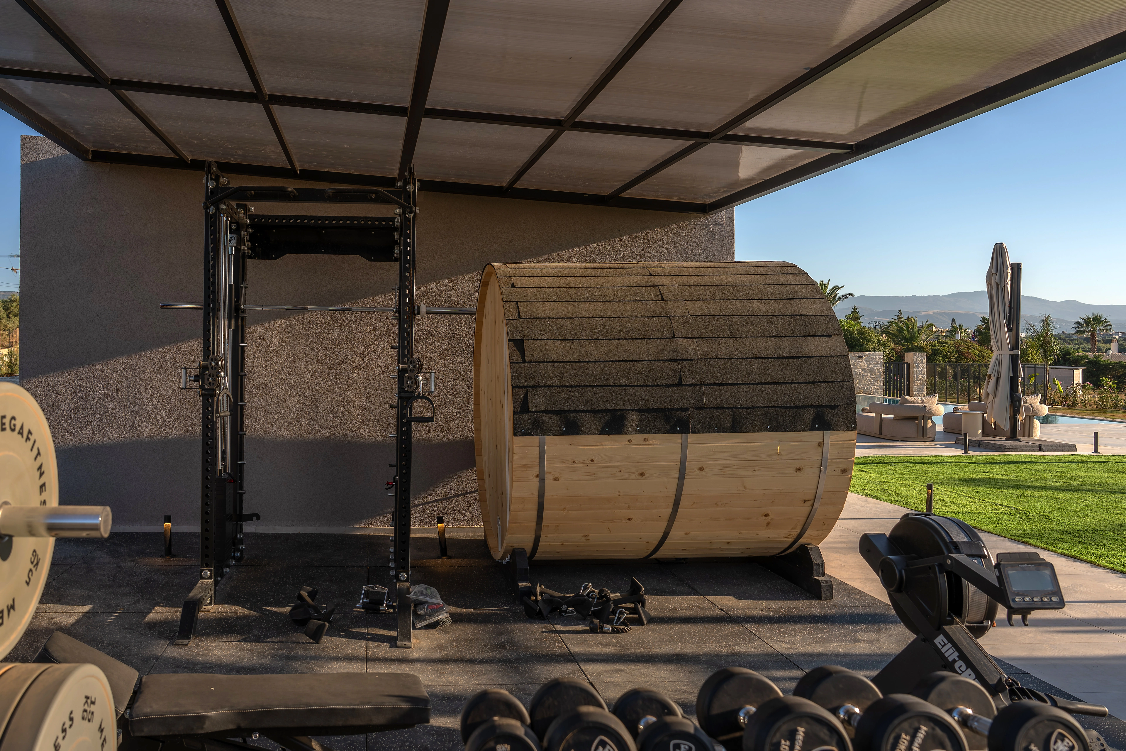 Right Crete private outdoor gym with free weights and training rack