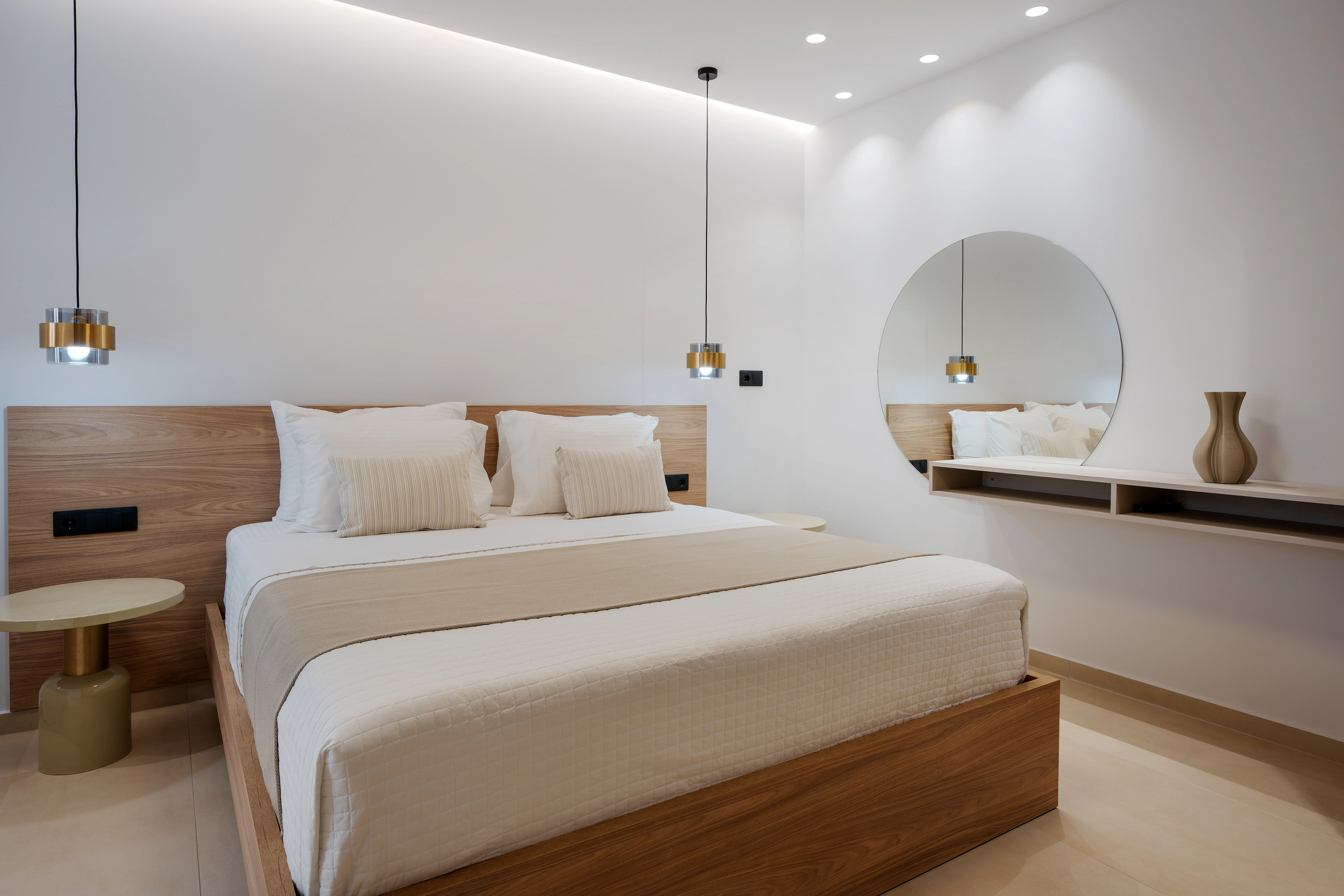 Front view of the king-size bed and dressing table in Left Crete bedroom 02
