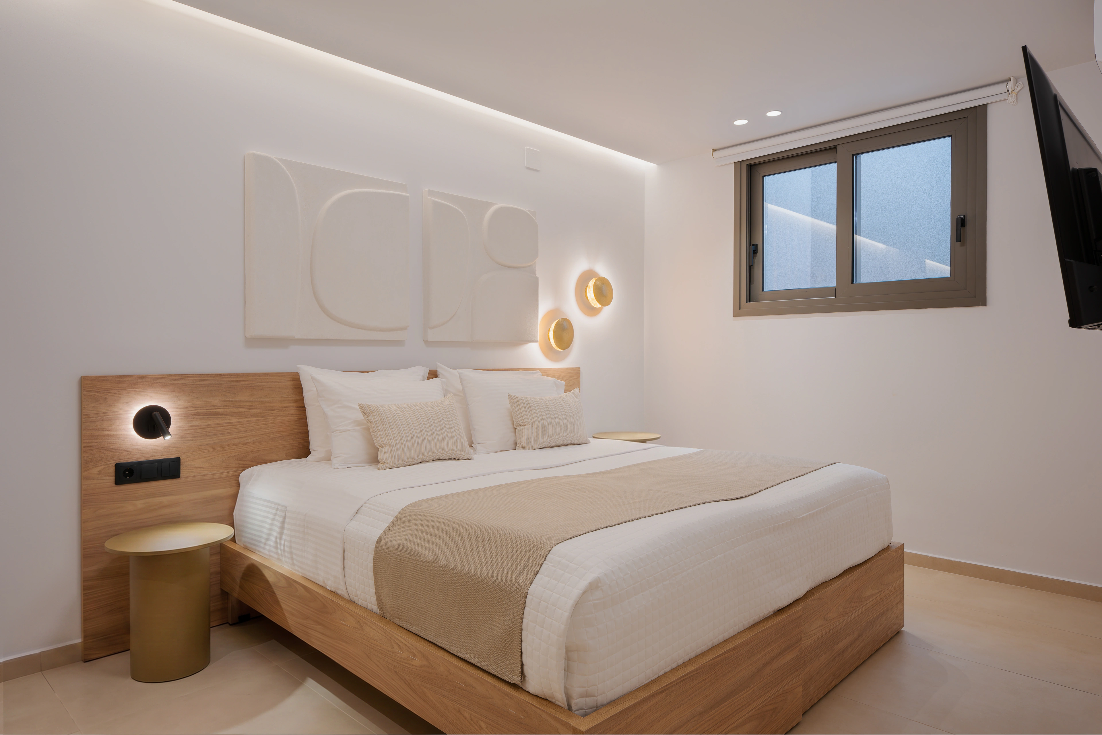 Right Crete bedroom 02 with a king-size bed and softly illuminated headboard