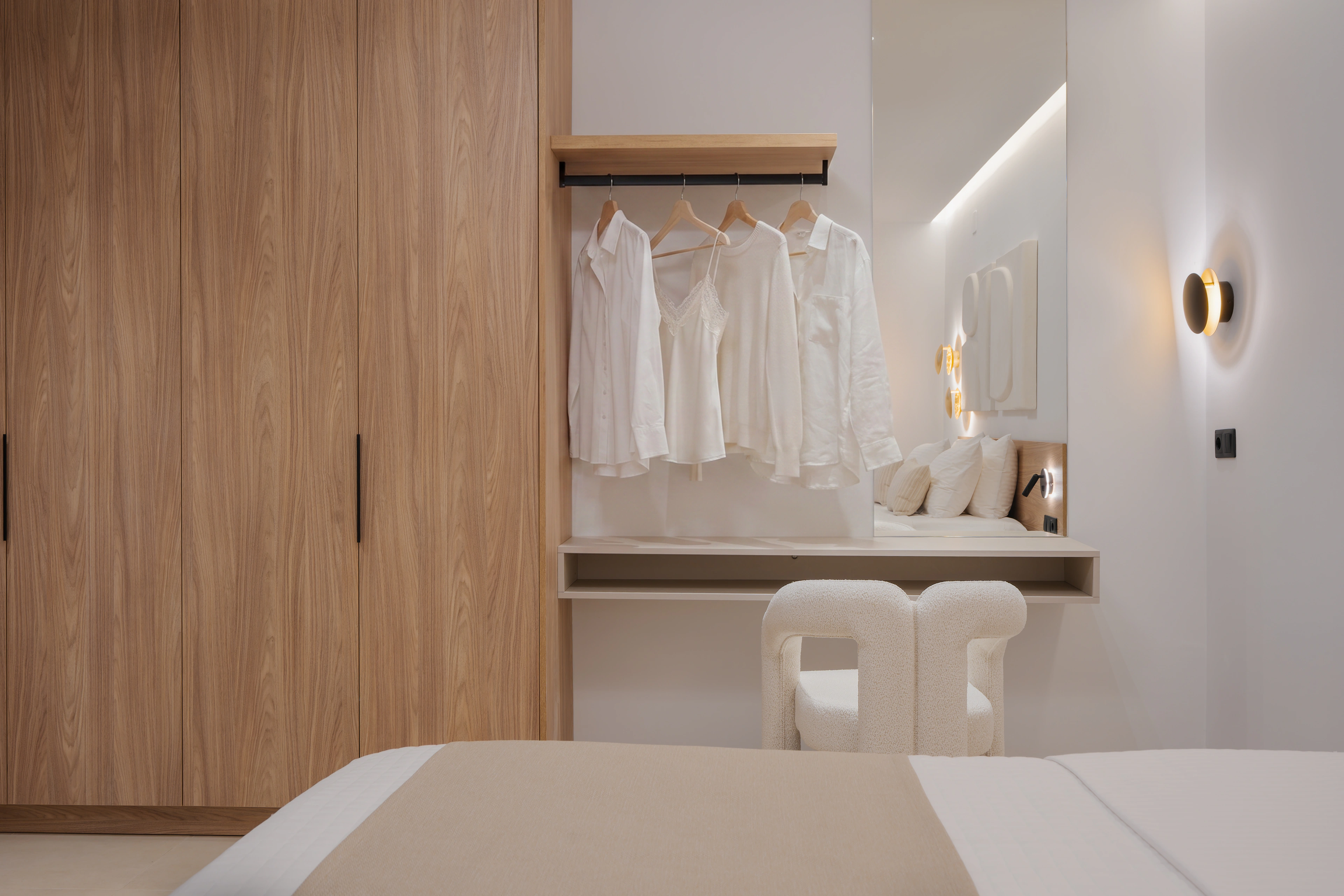 Right Crete bedroom 02 dressing area with timber wardrobe and open hanging rail