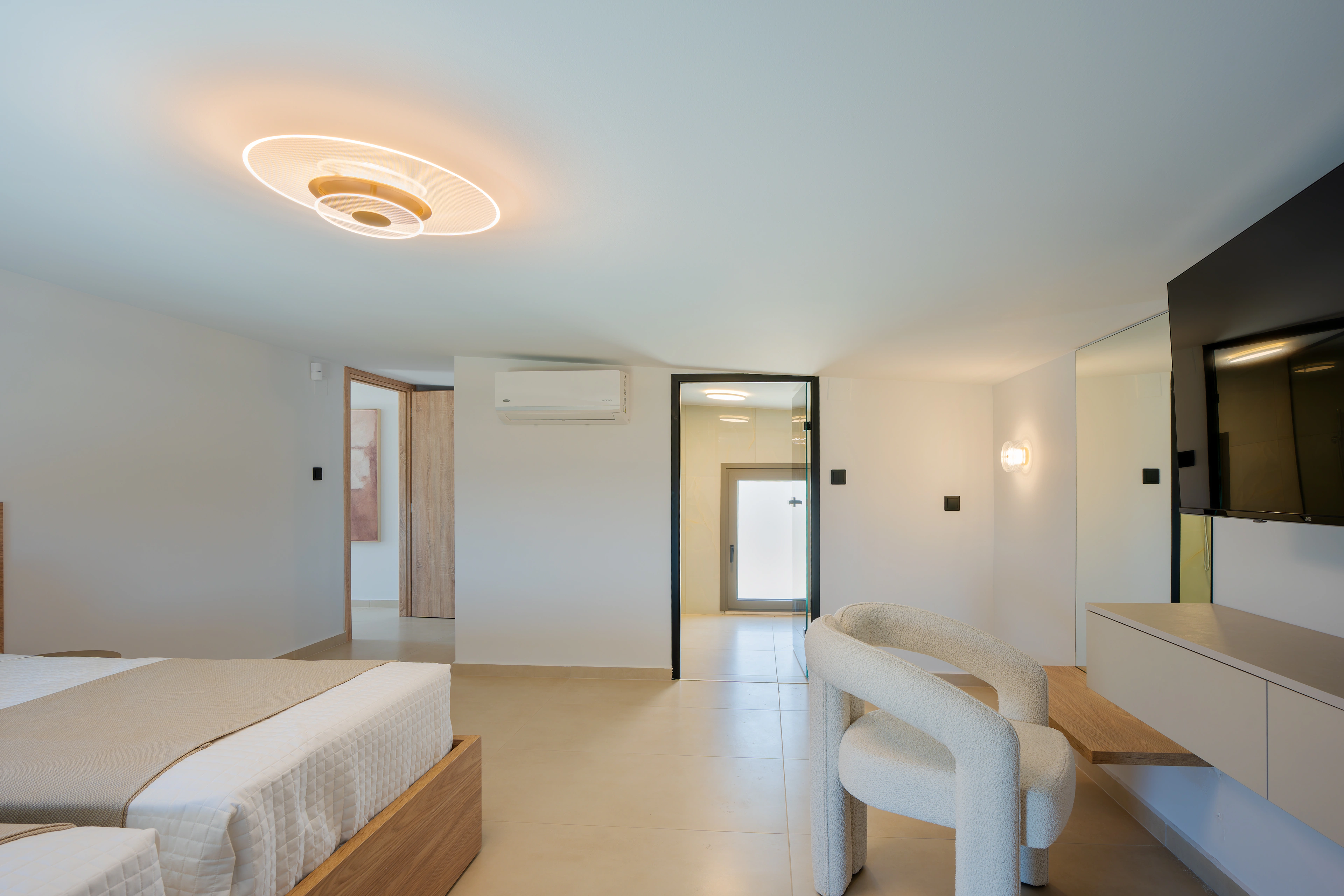 Right Crete bedroom 03 showing its king-size bed and dressing areas