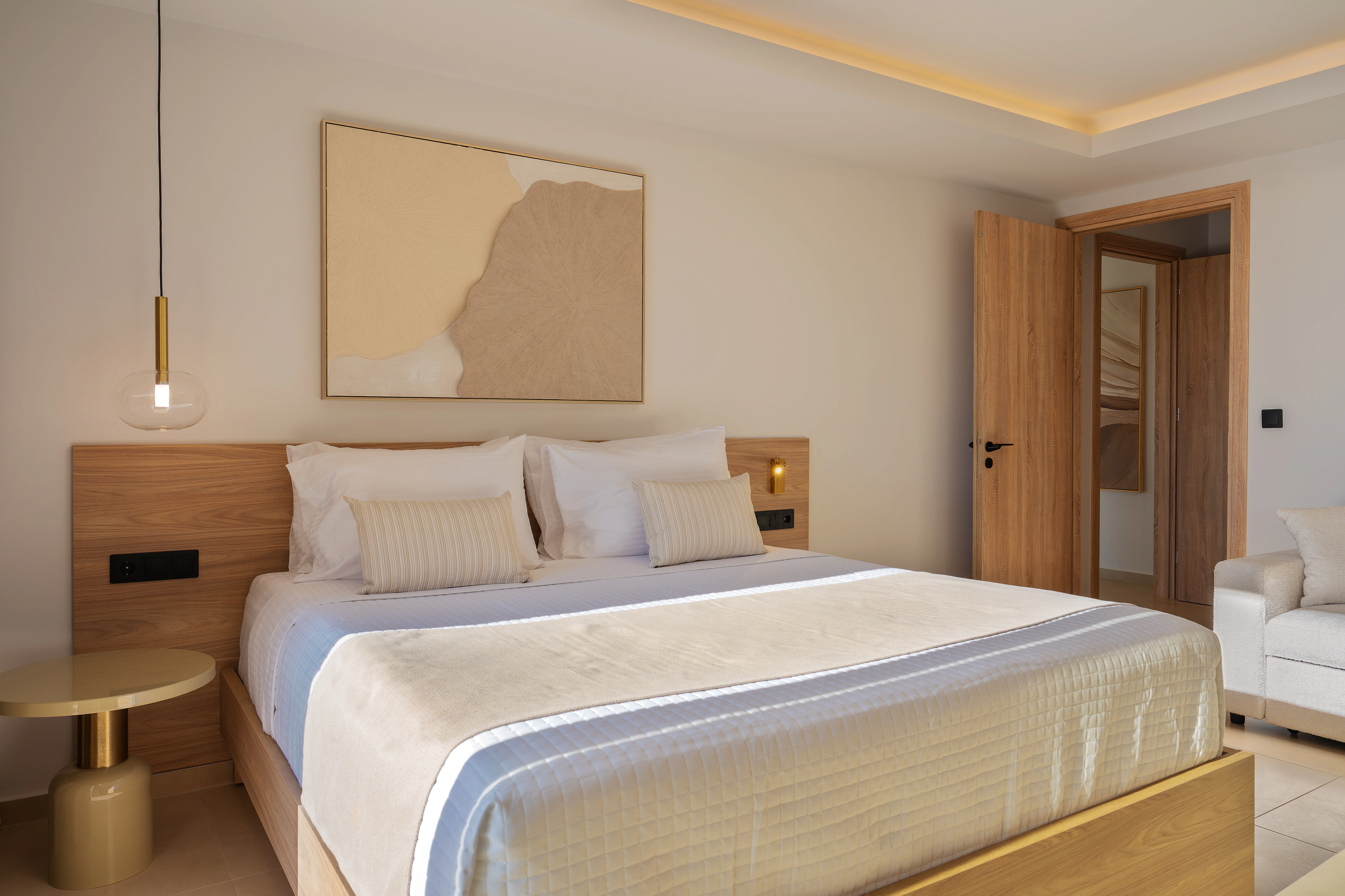 Two single beds and softly lit headboards in Right Crete bedroom 05