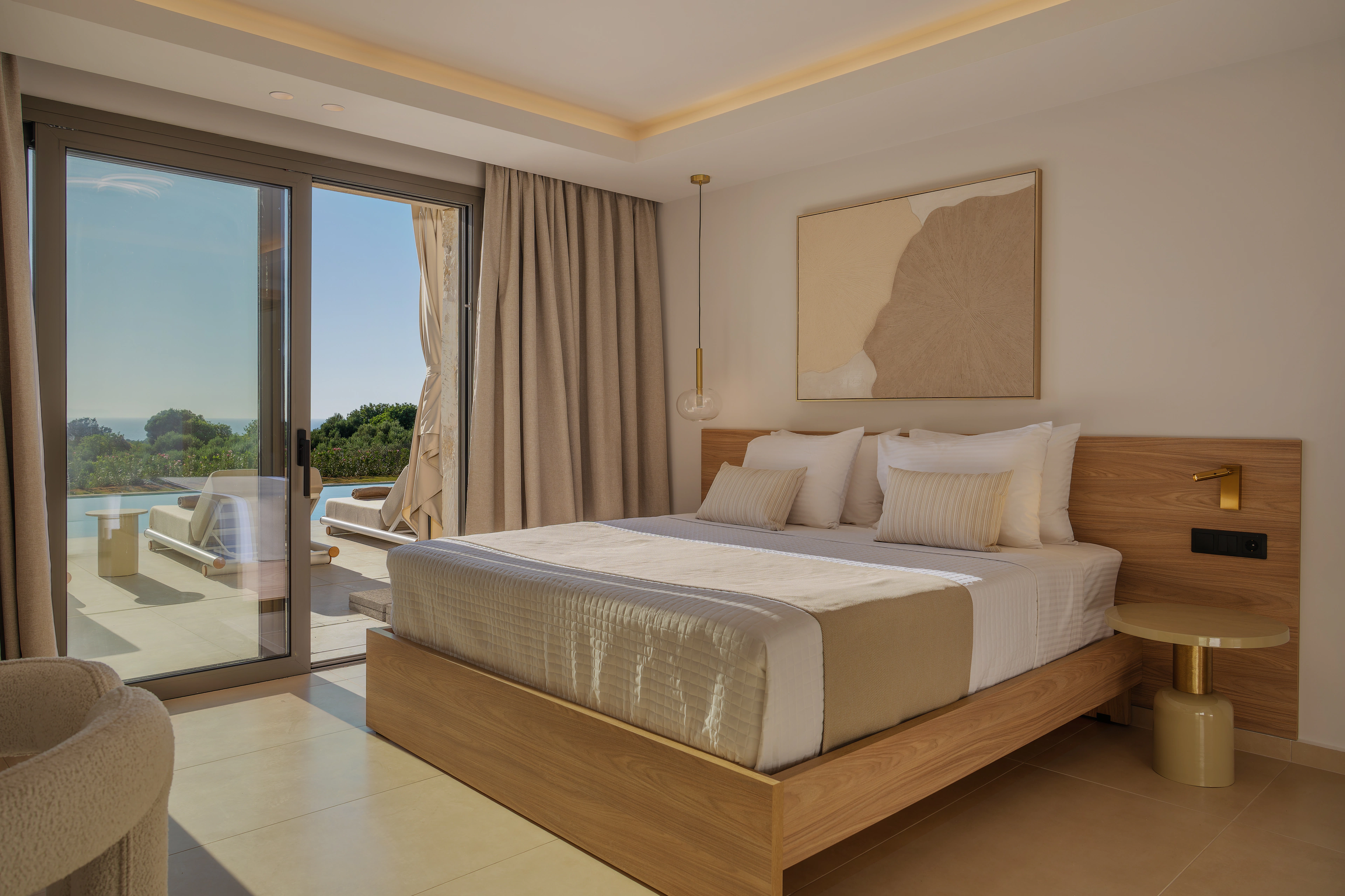 Wide garden-facing view across the two single beds in Right Crete bedroom 05