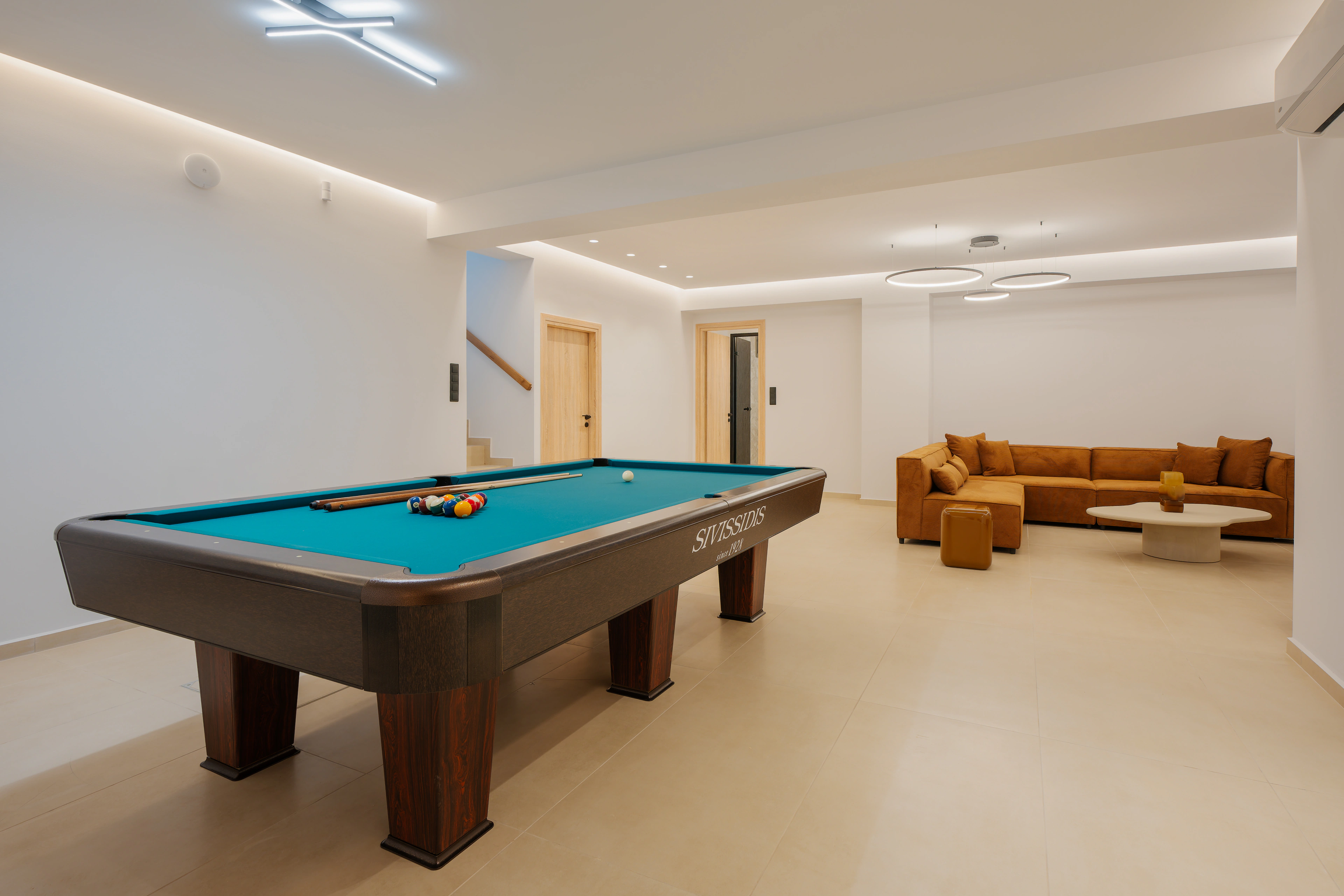 Right Crete's lower lounge and full-size pool table