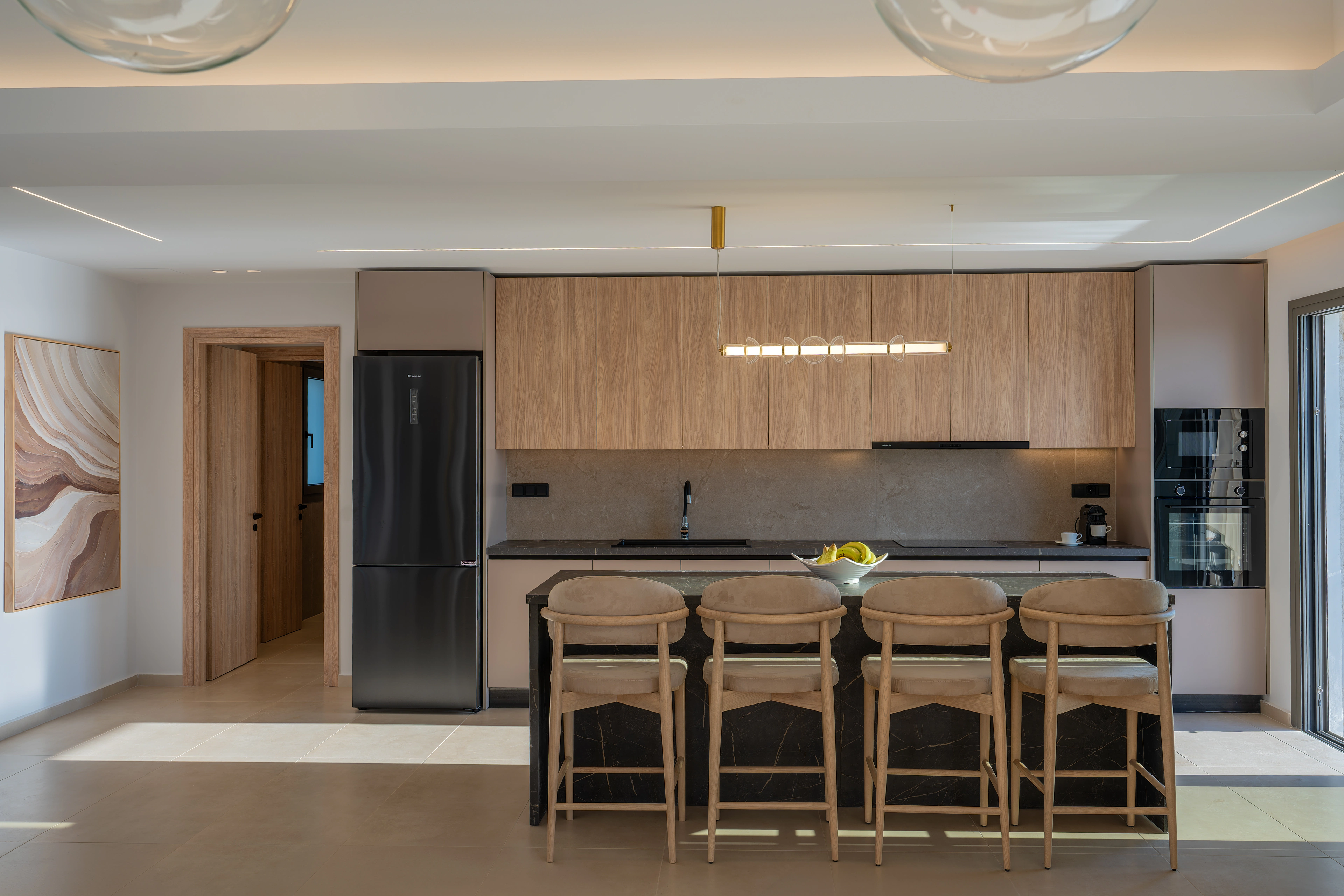 Front view of Right Crete's kitchen and breakfast island